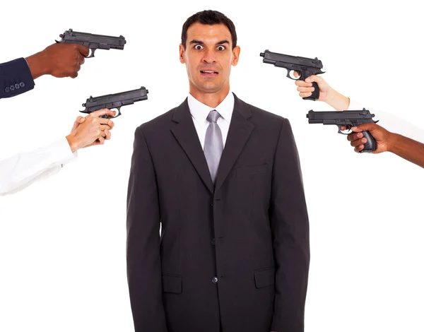 Businessman being attacked at gun point by colleagues — Stock Photo, Image