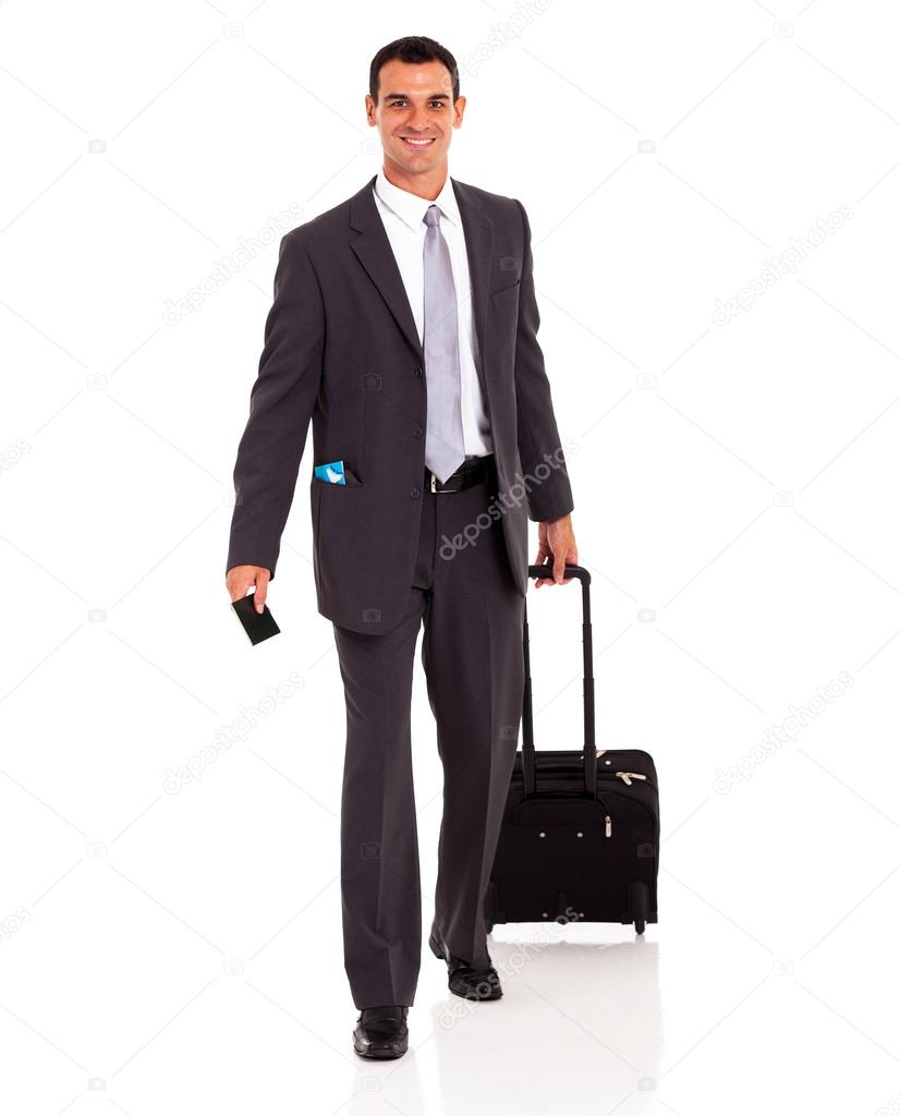 businessman walking with trolley bag and passport