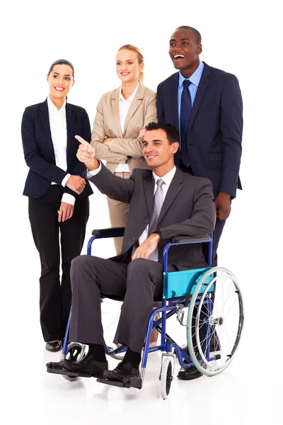 Empresário deficiente líder em cadeira de rodas apontando — Fotografia de Stock