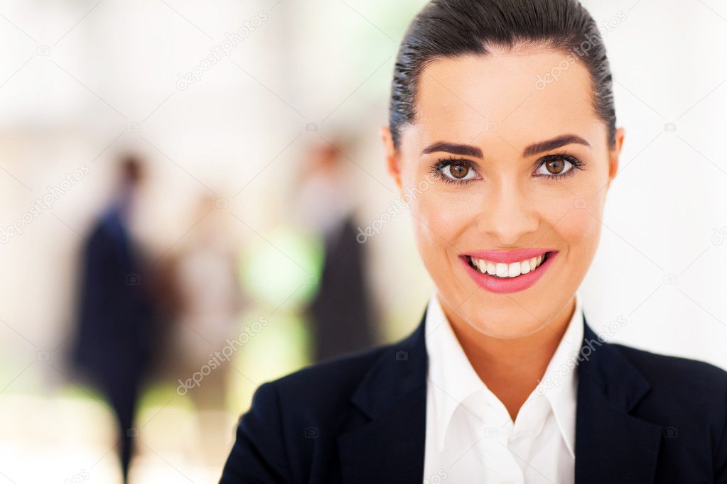 attractive young businesswoman face closeup in office