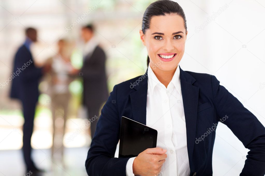 pretty businesswoman portrait with tablet computer in modern office
