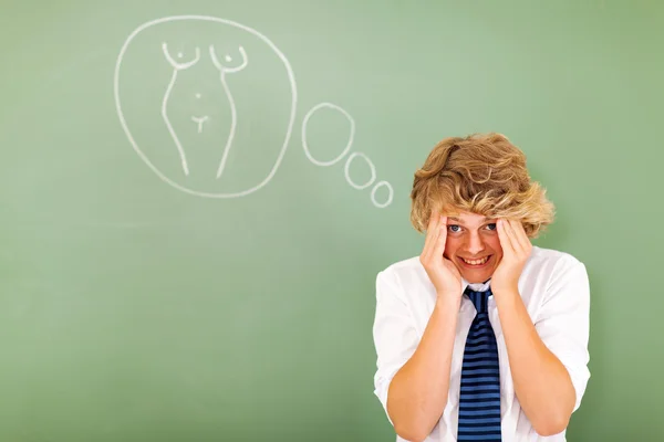 High school boy feeling embarrassed when thinking about female — Stock Photo, Image