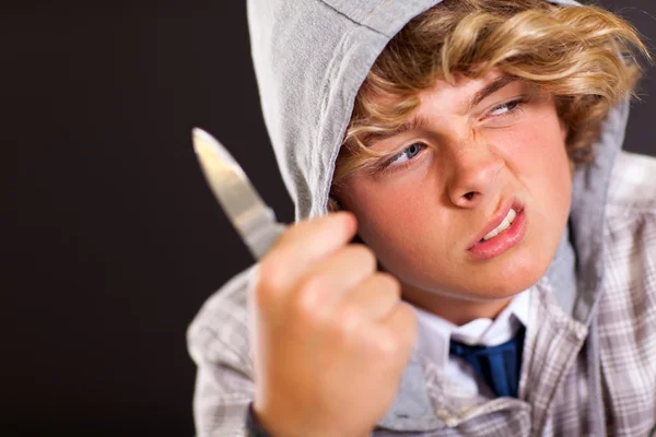 Violent teen boy with knife — Stock Photo, Image