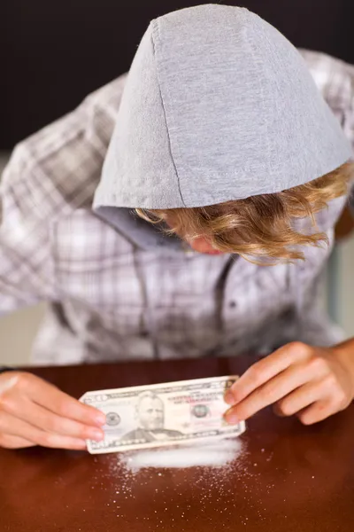 Teen boy taking drug — Stock Photo, Image