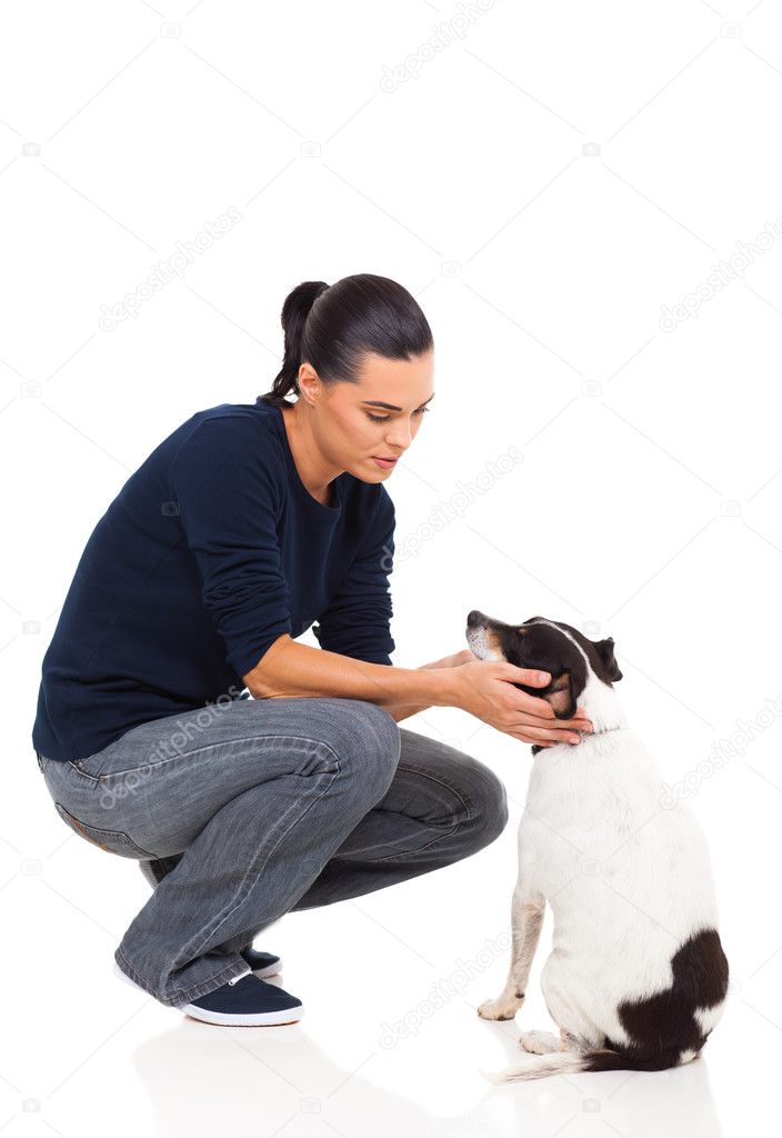 pretty woman playing with her dog