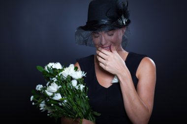 sad widow crying at funeral clipart