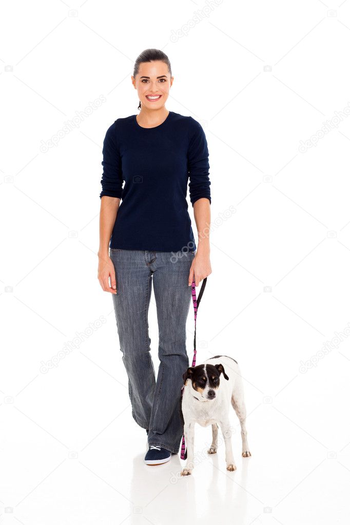 young woman walking with dog