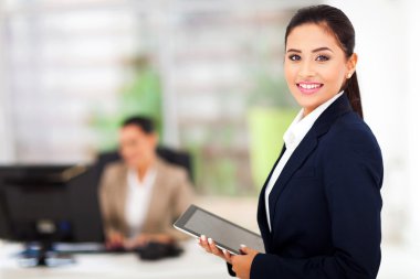 modern businesswoman holding tablet computer