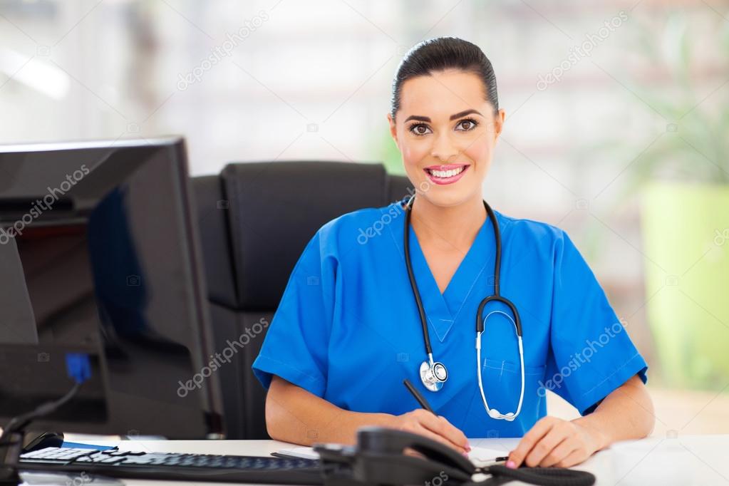 female doctor writing report