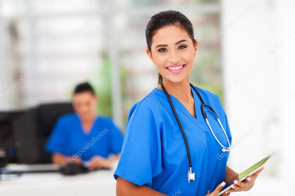 young medical worker holding tablet computer