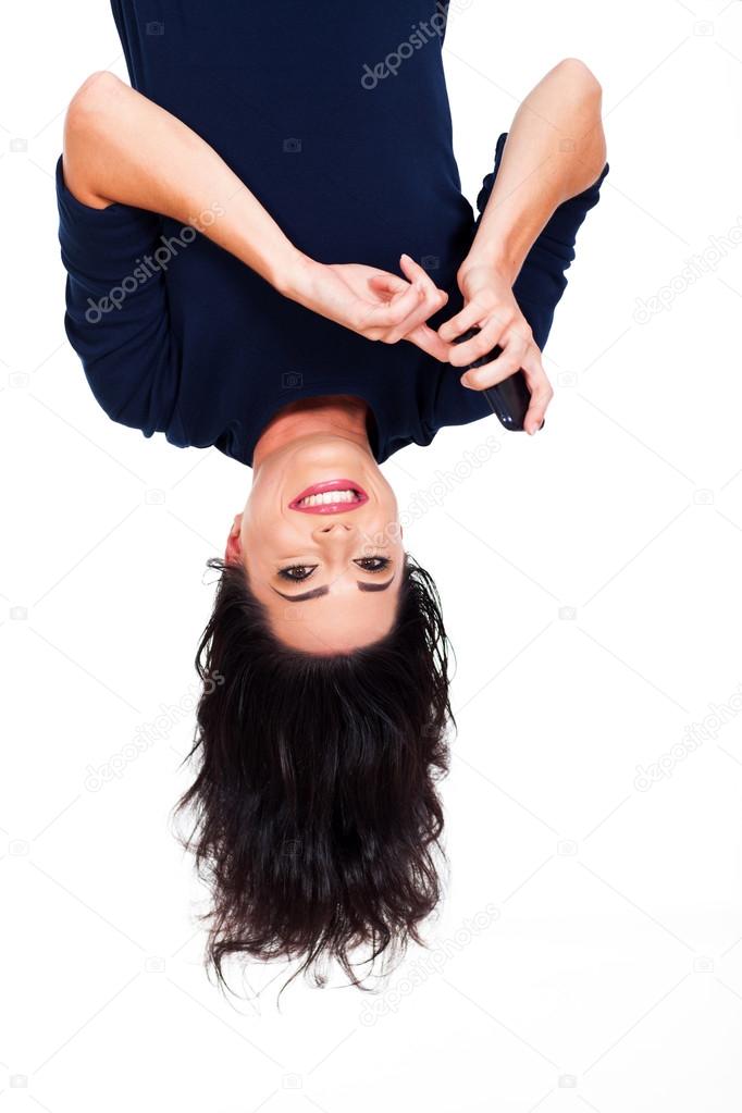 woman reading emails on smart phone upside down