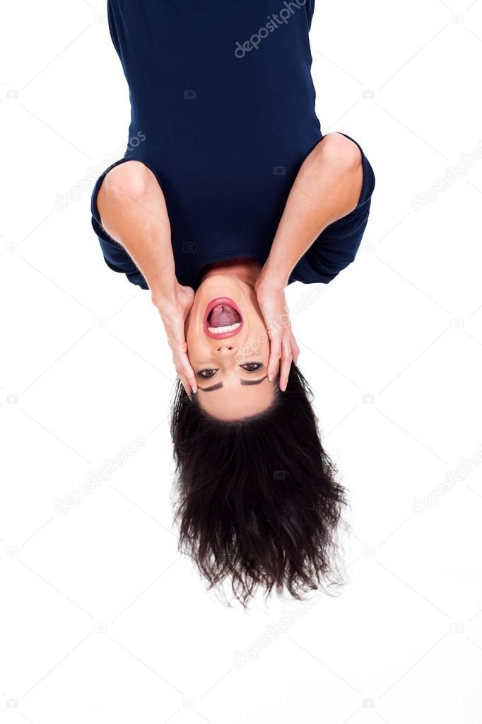 upside down photo of beautiful young woman