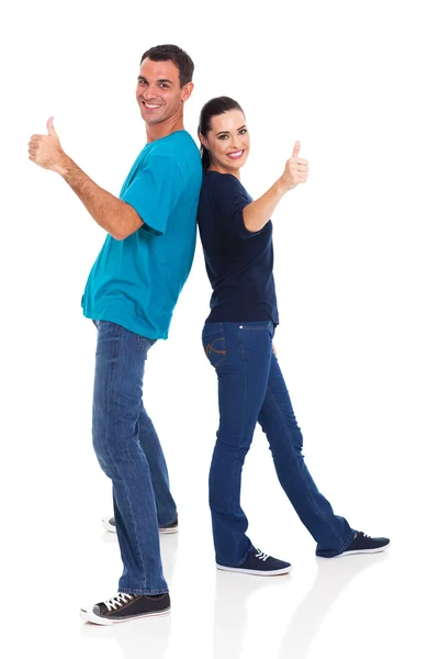 Loving couple giving thumbs up — Stock Photo, Image