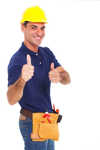 Jovem construtor dando polegares para cima — Fotografia de Stock