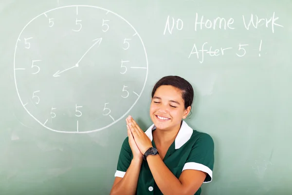 Colegiala rezando por ninguna tarea — Foto de Stock