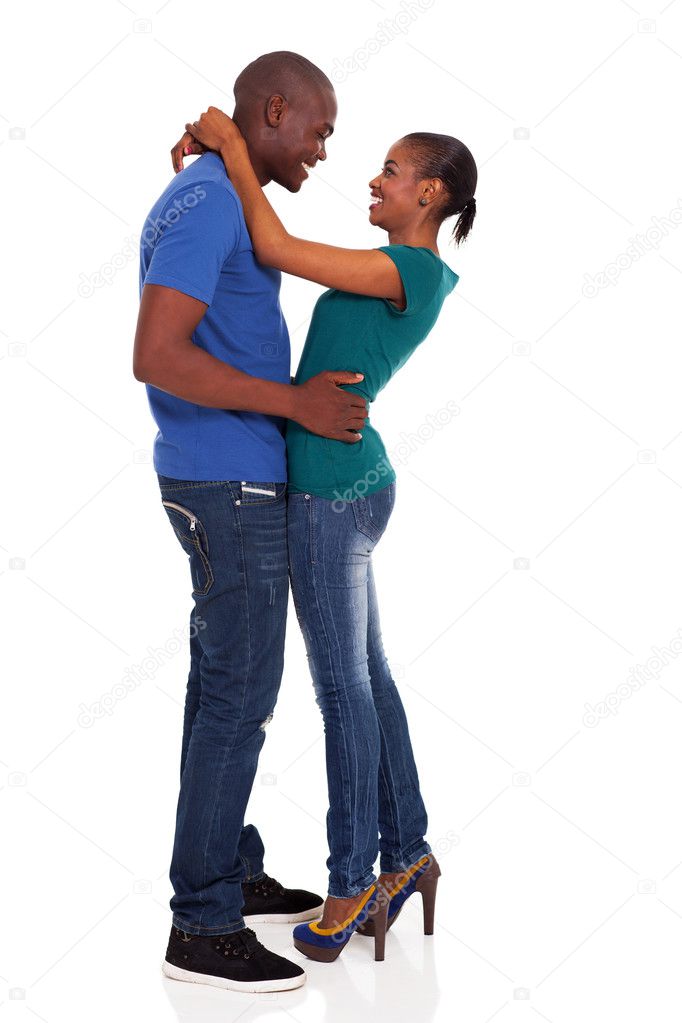 happy african young couple hugging