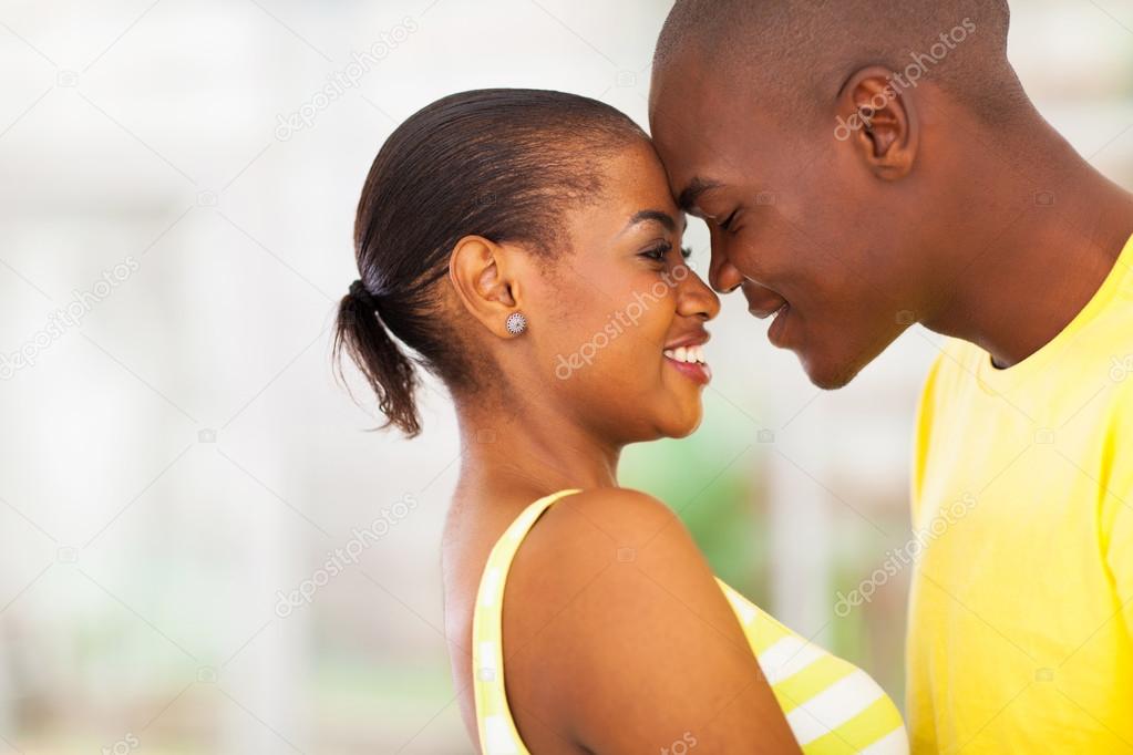 young african american couple flirting