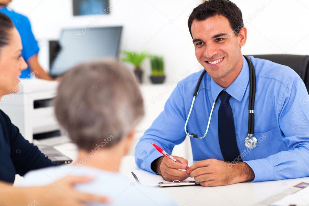 medical doctor consulting senior patient