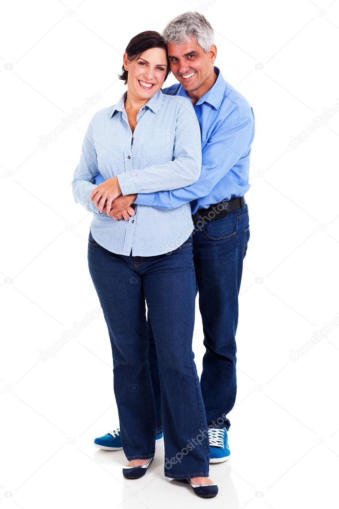middle aged couple embracing