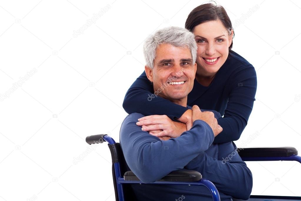 loving supportive wife hugging handicapped husband