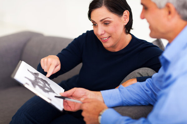 mature female patient looking at Rorschach inkblot with psycholo