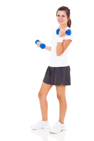 Teen girl lifting dumbbells — Stock Photo, Image