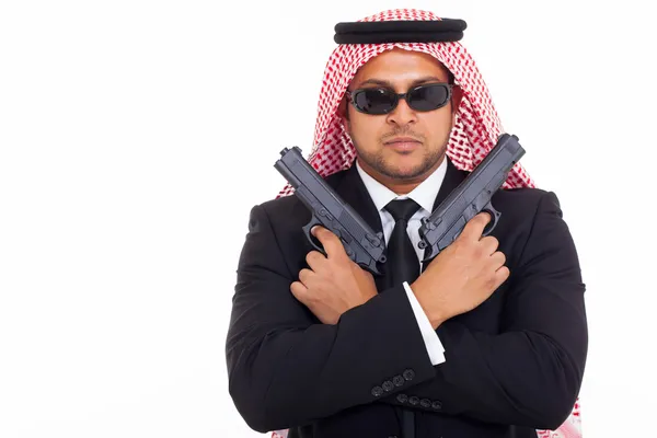 Арабийский мафиози с пистолетами. — стоковое фото