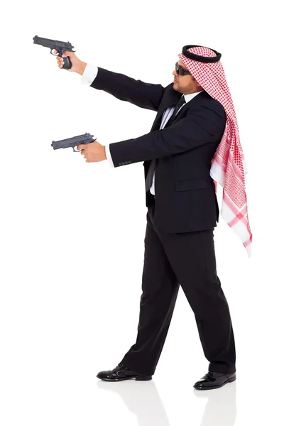 Árabe sicario sosteniendo armas de fuego — Foto de Stock