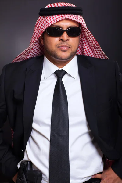 Islamic bodyguard with a gun — Stock Photo, Image