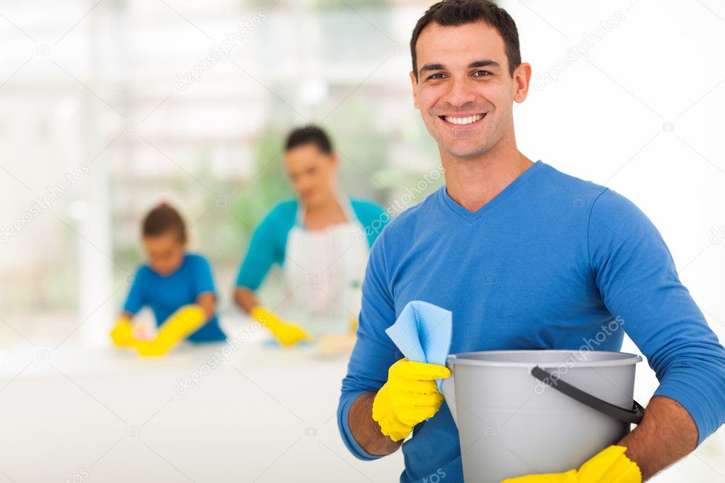 happy family man cleaning home with family