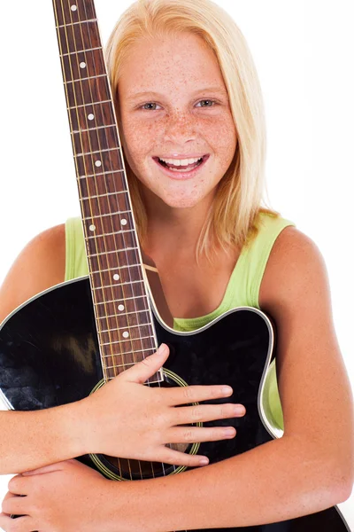 Bela jovem pré-adolescente menina segurando uma guitarra — Fotografia de Stock