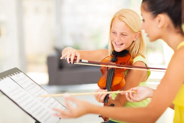 Preteen girl in music class — Stock Photo, Image