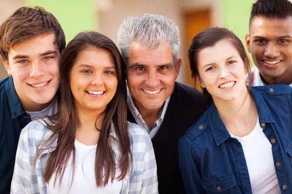 Teacher and teenage students close up — Stock Photo, Image