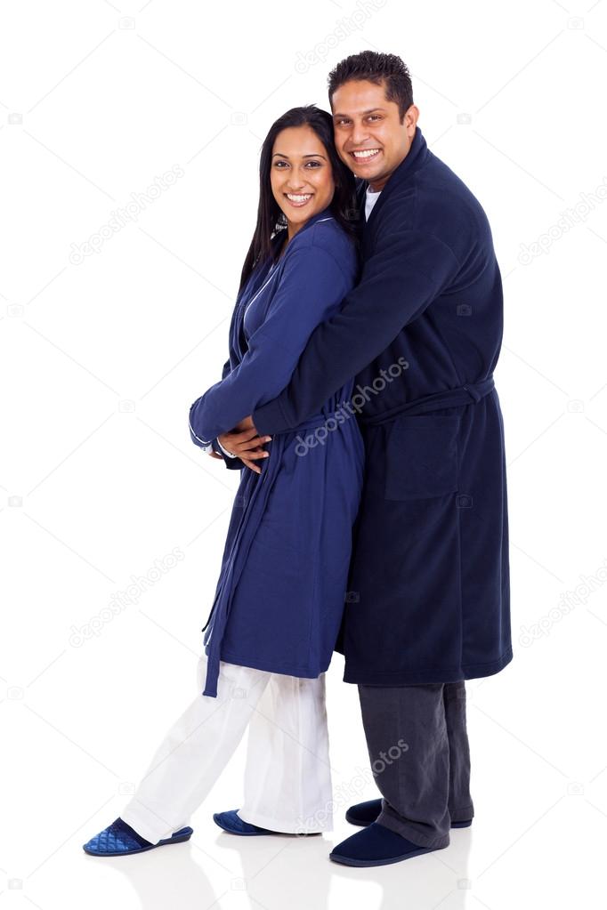 indian couple embracing wearing nightgowns