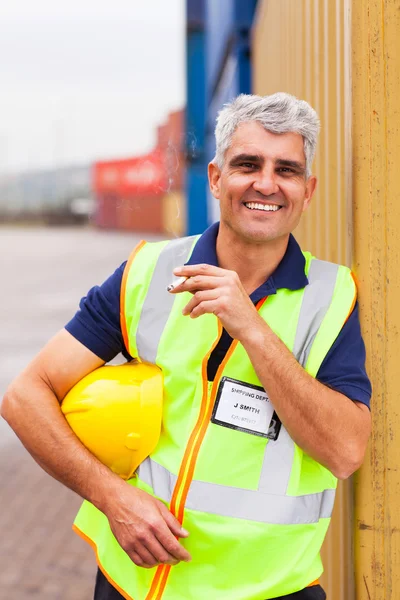 Shipping company worker smoking — Stock Photo, Image