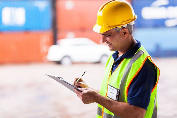 senior worker working at harbor
