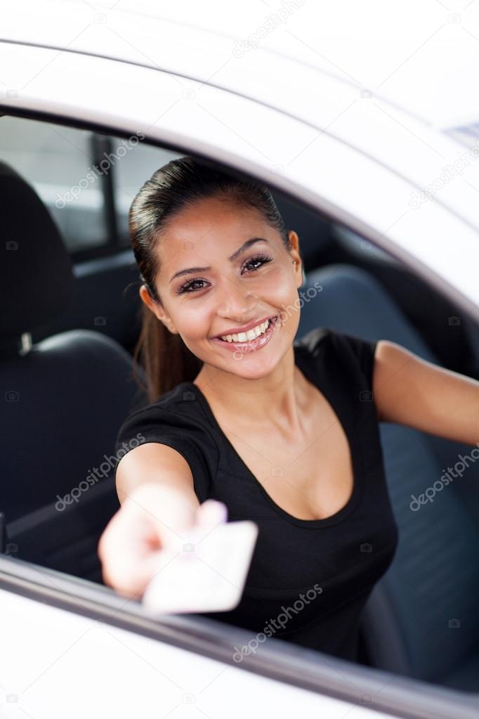 business woman handing her driving licence