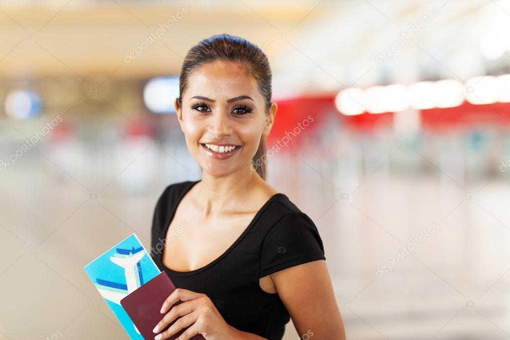 young business woman with passport and air ticket