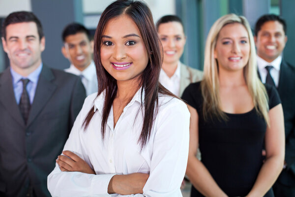 young indian businesswoman and team