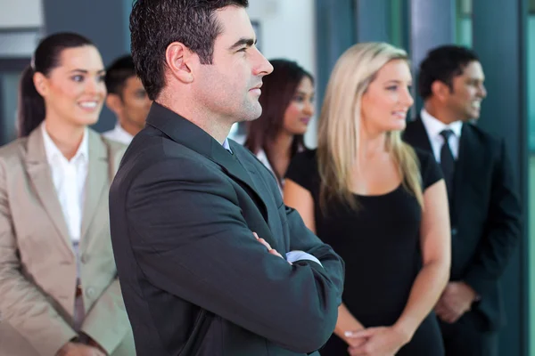 Doordachte zakenman en collega 's — Stockfoto