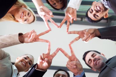 Business people hands forming a star shape clipart
