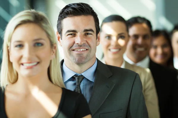 Grupo de empresários em uma fileira — Fotografia de Stock