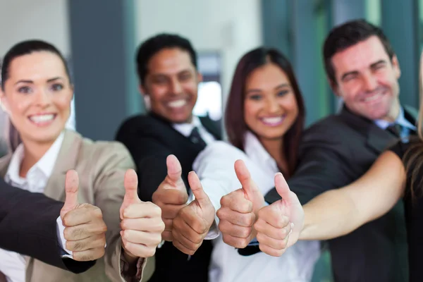 Business group giving thumbs up — Stock Photo, Image