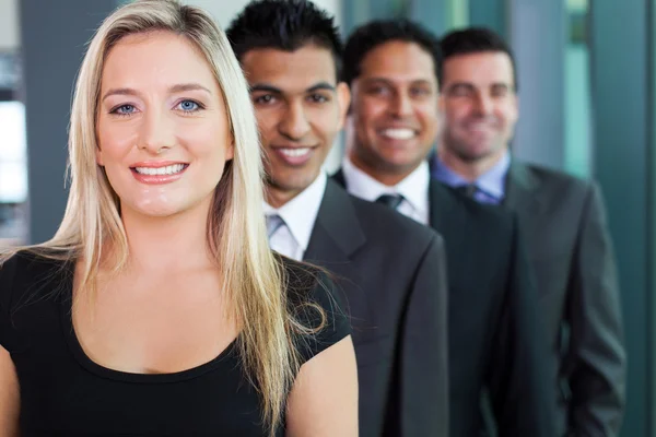 Grupo de negocios en una fila sonriendo — Foto de Stock