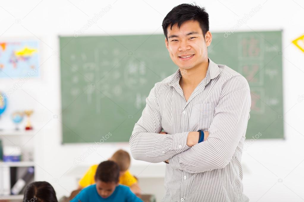 male asian elementary school teacher