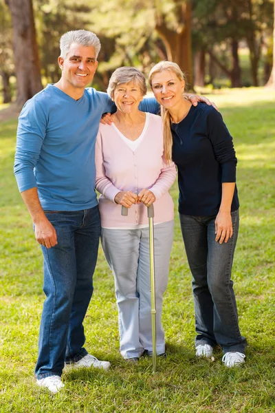 Middle aged couple and mother outdoors — Stock Photo, Image