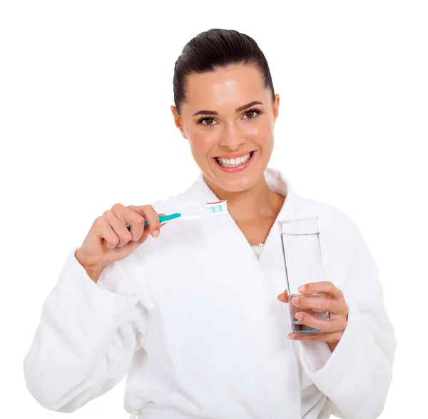 Genç bir kadın tutarak diş fırçası — Stok fotoğraf