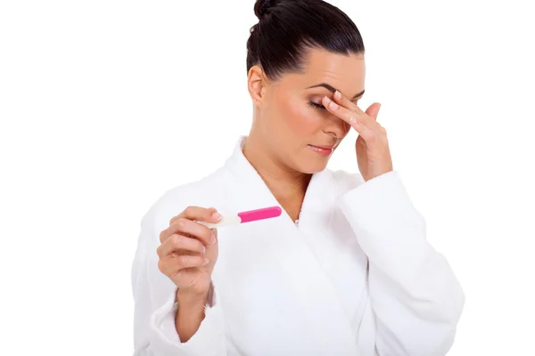 Woman scared to see result of pregnancy test — Stock Photo, Image