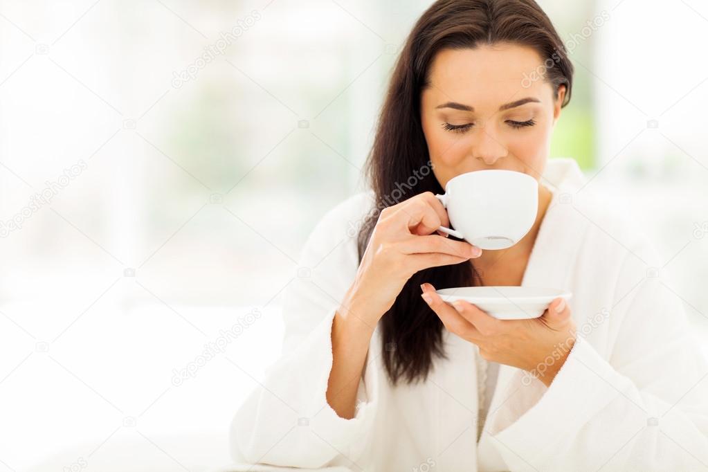 Woman in bathrobe drinking coffee Stock Photo by ©michaeljung 29433815