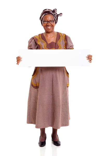 Senior african woman holding white board — Stock Photo, Image